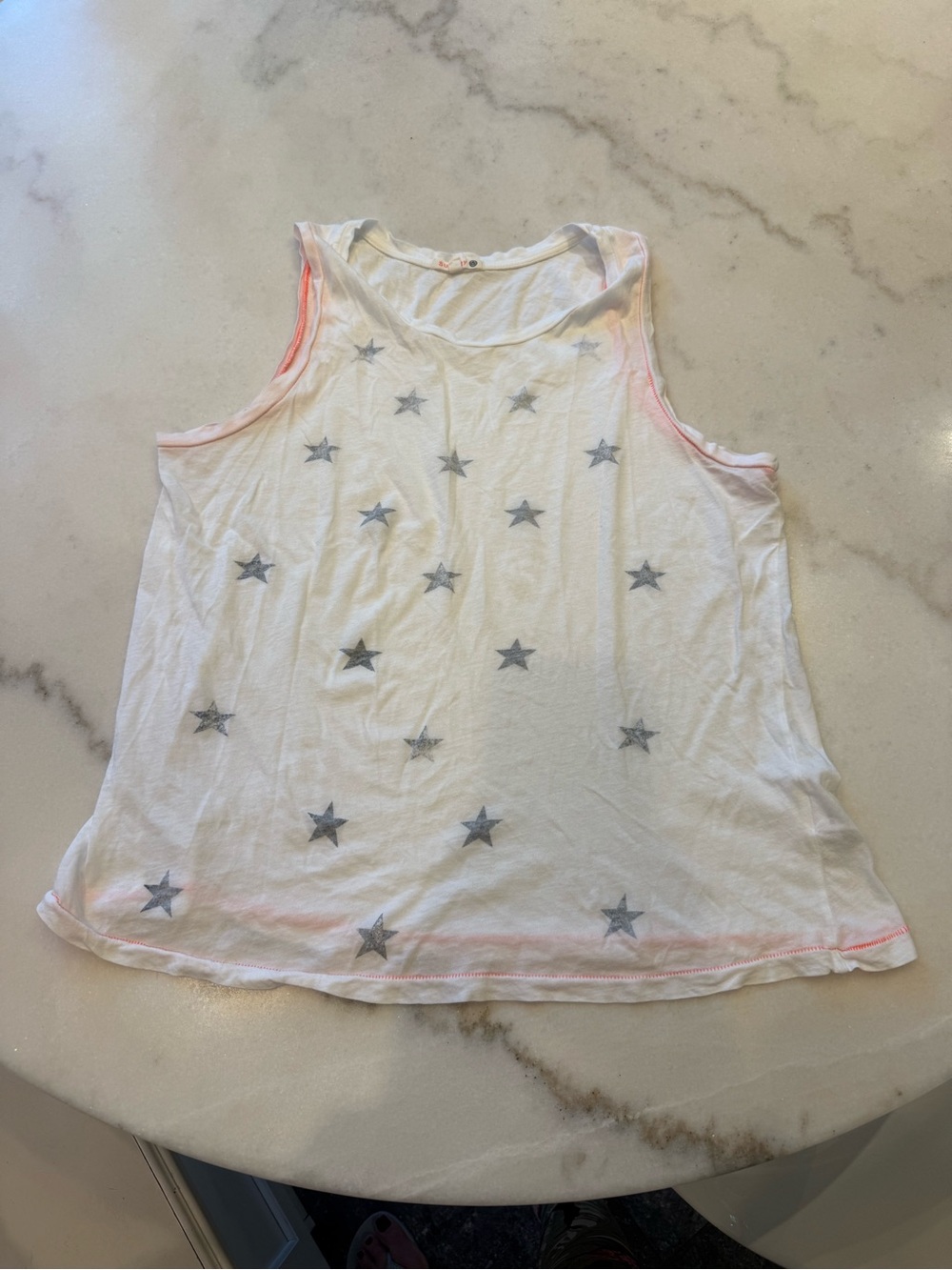 Sundry White tank top with faded black Star Print and orange Trim